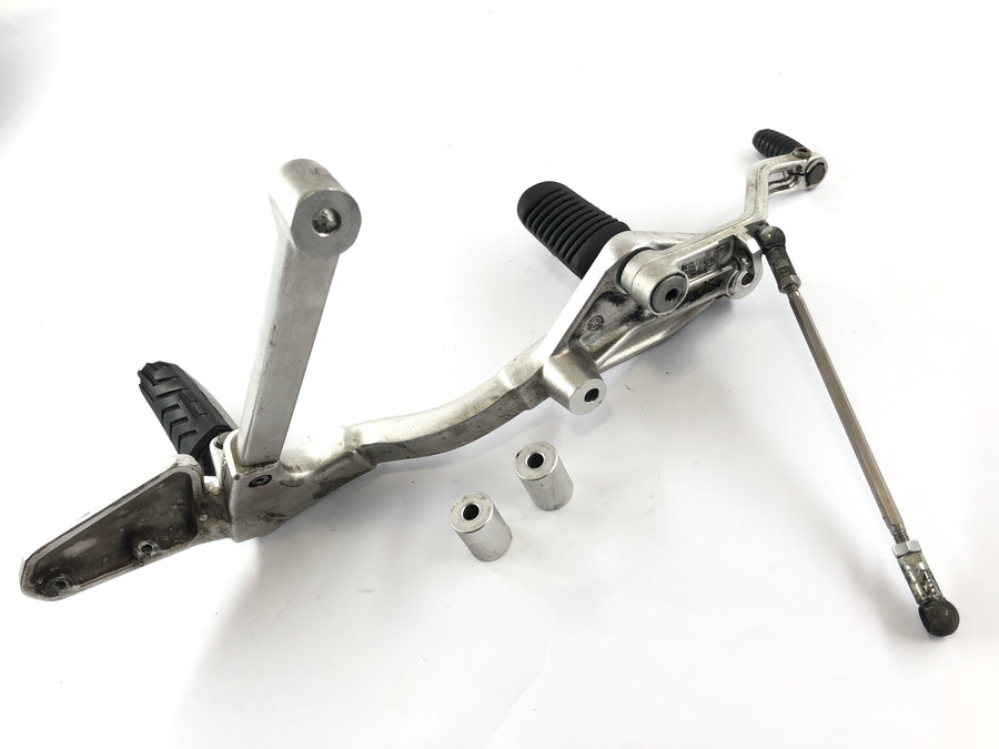 Moto Guzzi Stelvio 1200 8V [2011] - Footrest holder left with gear lever