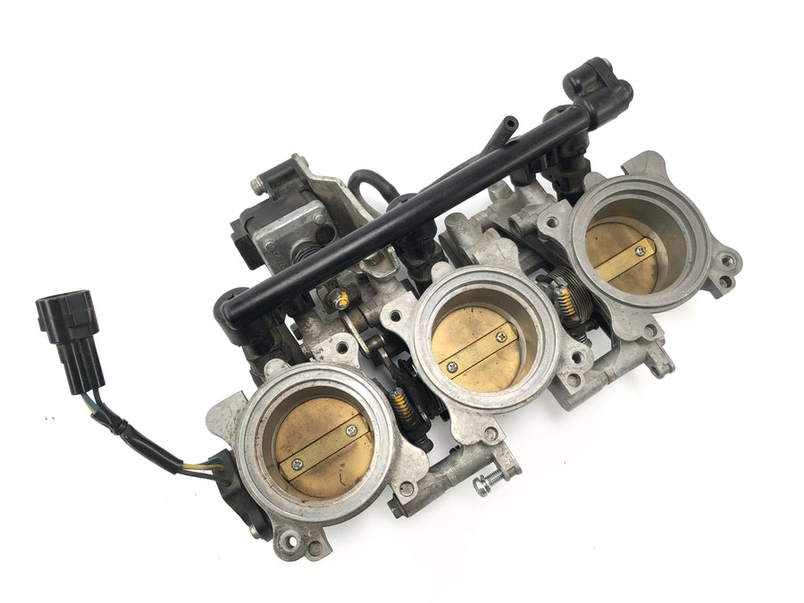 Triumph Street Triple R 675 D67ld [2010] - Injector in de gasklep