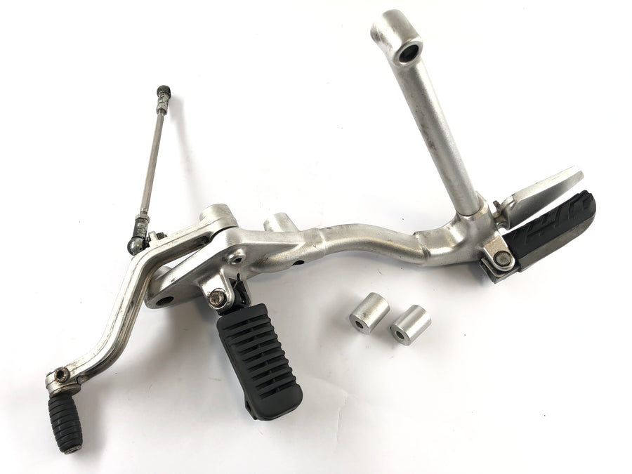Moto Guzzi Stelvio 1200 8V [2011] - Footrest holder left with gear lever